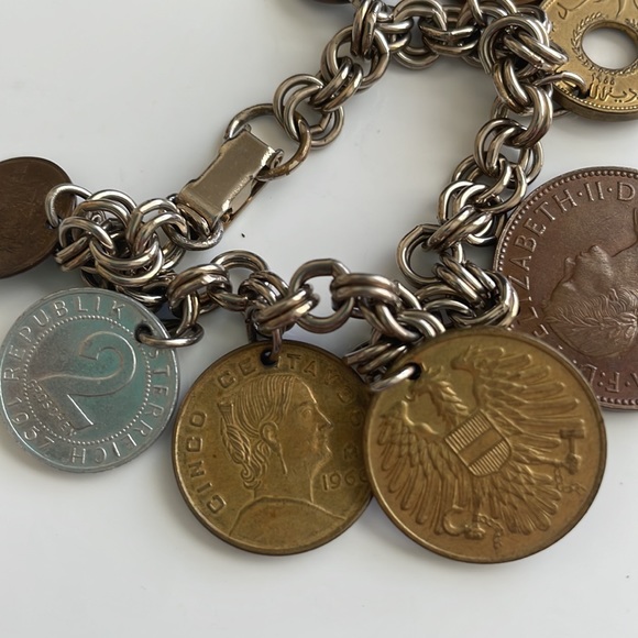 Vintage coin charm bracelet with various European coins on a silver tone chain - Picture 9 of 12
